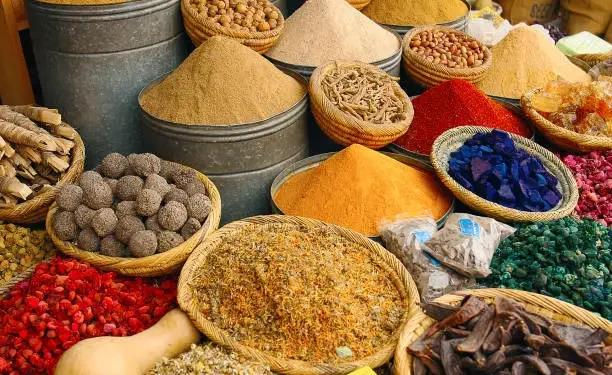 Nigerian market traders selling food items amid rising inflation and increasing prices