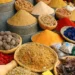 Nigerian market traders selling food items amid rising inflation and increasing prices