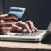 Nigerian investor checking online investment opportunities and avoiding financial scams