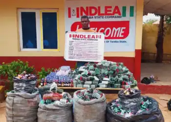 NDLEA operatives display illicit drugs recovered during coordinated anti-narcotics operations across several states.