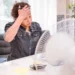 People staying cool during a heatwave by drinking water and avoiding extreme heat