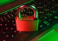 Person understanding password managers and using a secure password vault to protect online accounts.