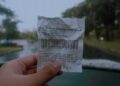 Person understanding receipts and organizing proof of payment for better financial record keeping.