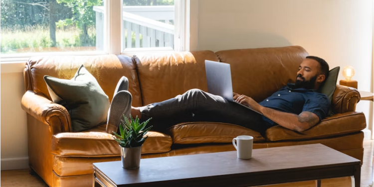 Professional staying productive while working from home in a modern home office.