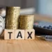 Small business owner managing tax obligations and financial records.