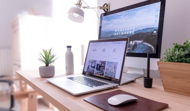 Laptop displaying free website management tools including SEO analytics, speed testing, and security dashboards.