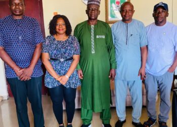 Kogi Information Permanent Secretary Awulu Tijani David with NUJ Information Chapel executives
