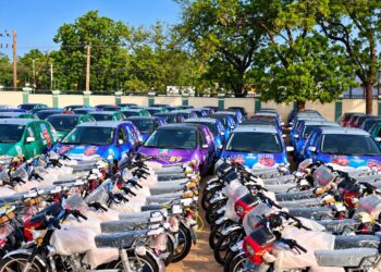 Musa Yaro Enabo presenting campaign vehicles and motorcycles to Governor Nasir Idris